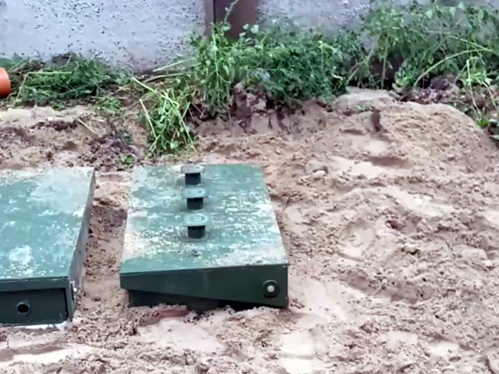 Станция биологической очистки для офиса после монтажа: над землёй только крышки